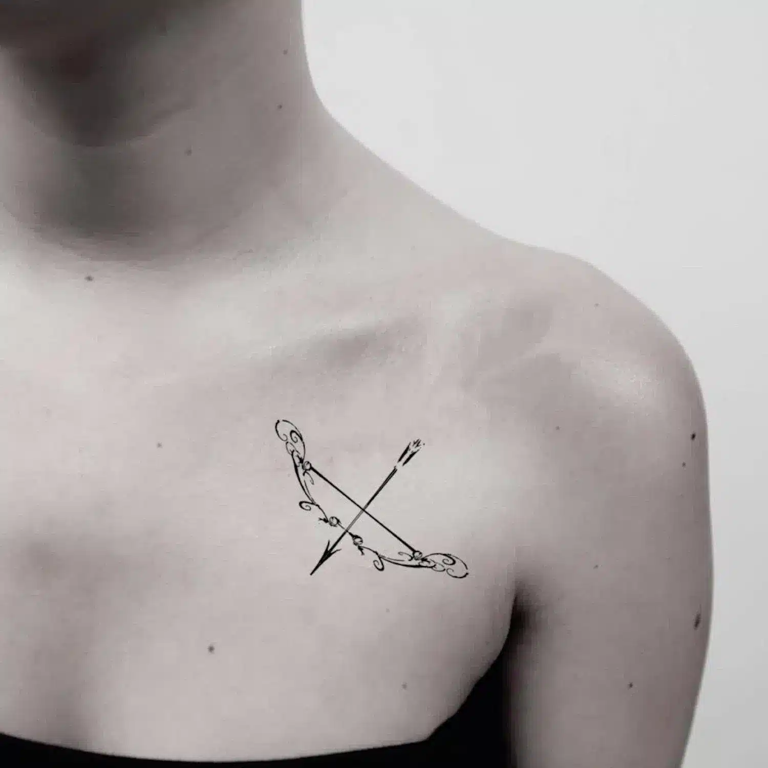 archer's bow across the collarbone