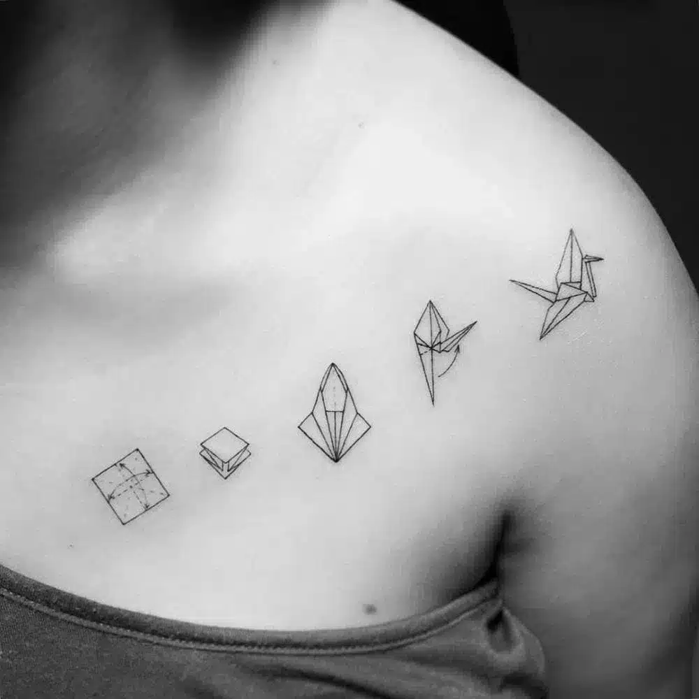 Delicate origami tattoo