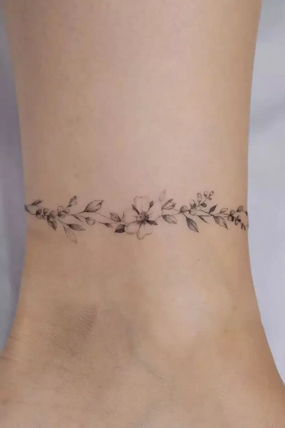 anklet-like tattoo