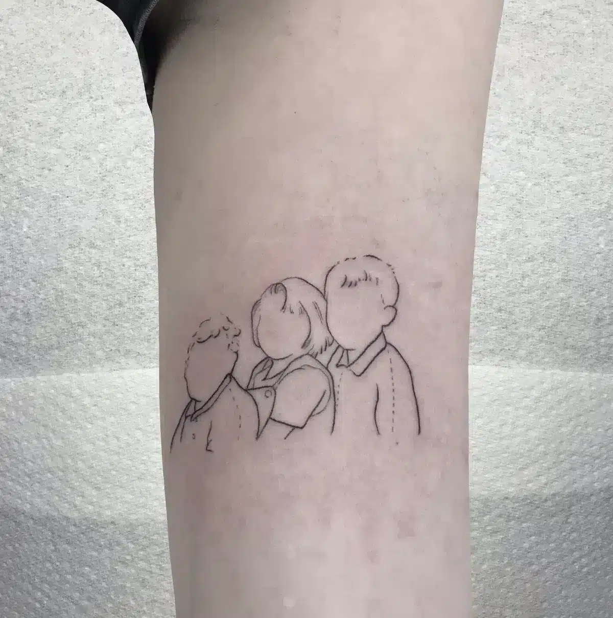 A minimal fine-line portrait of a child