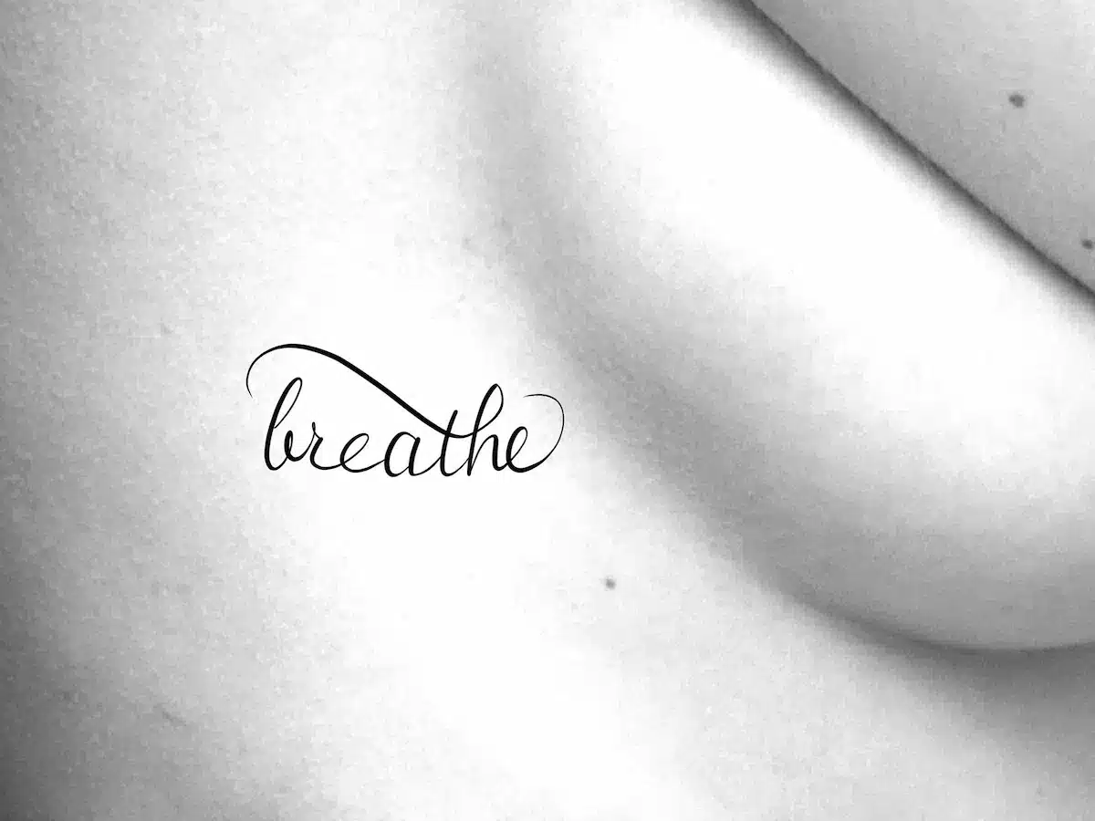 Continuous Script tattoo