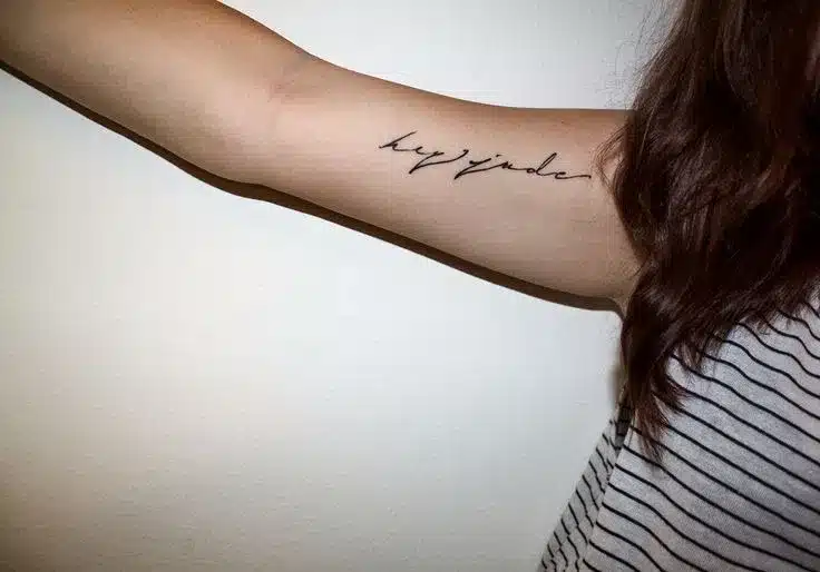 minimalist black tattoo
